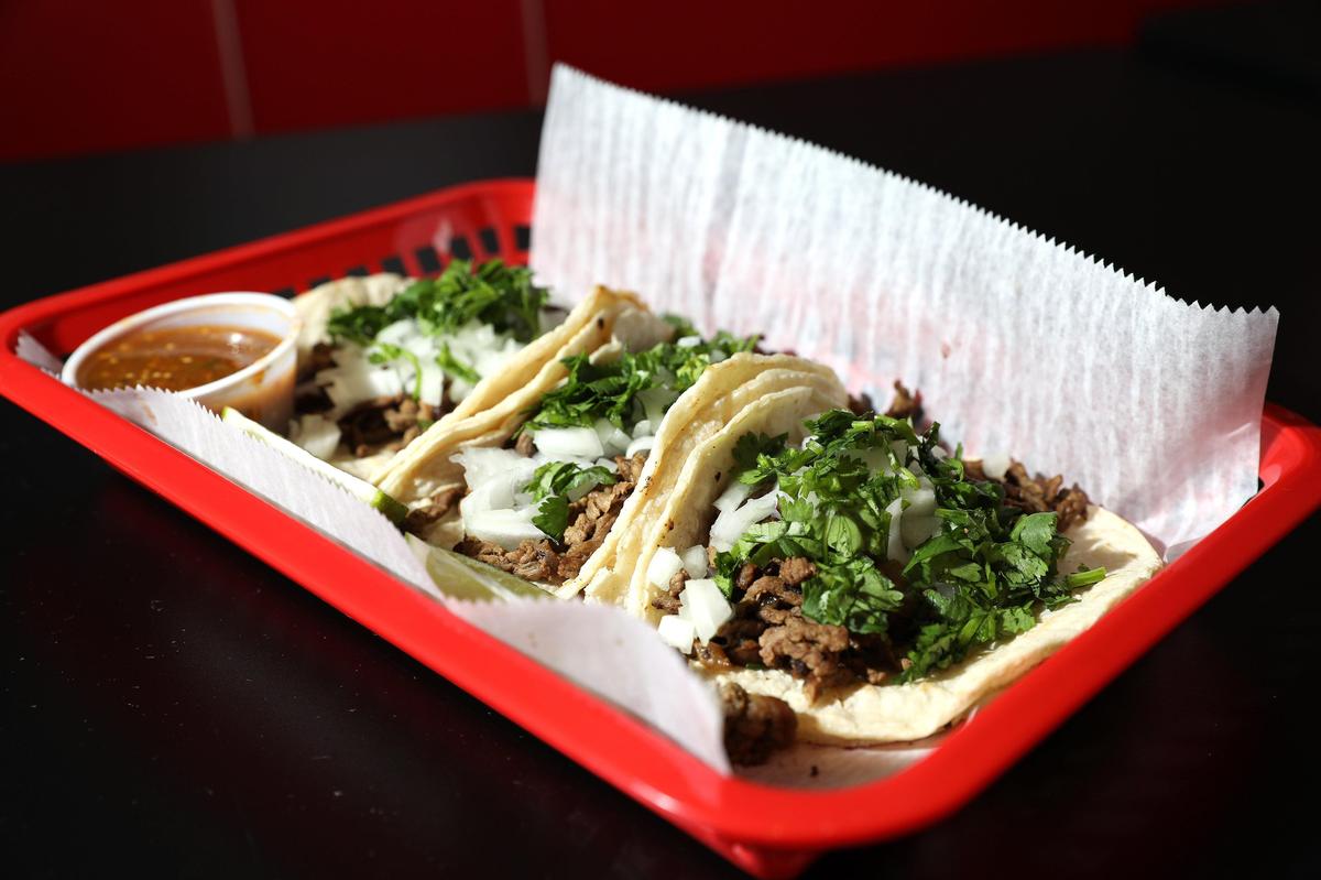 Steak tacos with cilantro, onion and tomatillo salsa at El Cid at 304 S. Limestone, the former home of Sav’s Grill.