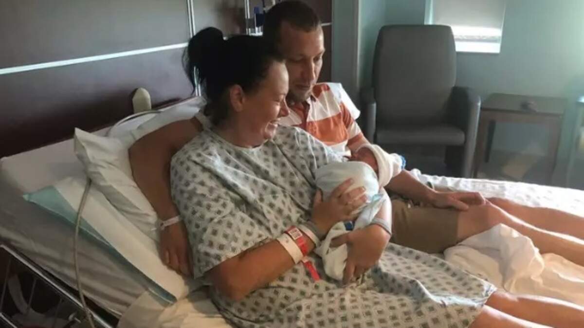 Cecilya Goin and her husband Bobby with their newborn son, William. William was born in the family’s vehicle on the way to the hospital in Lexington.