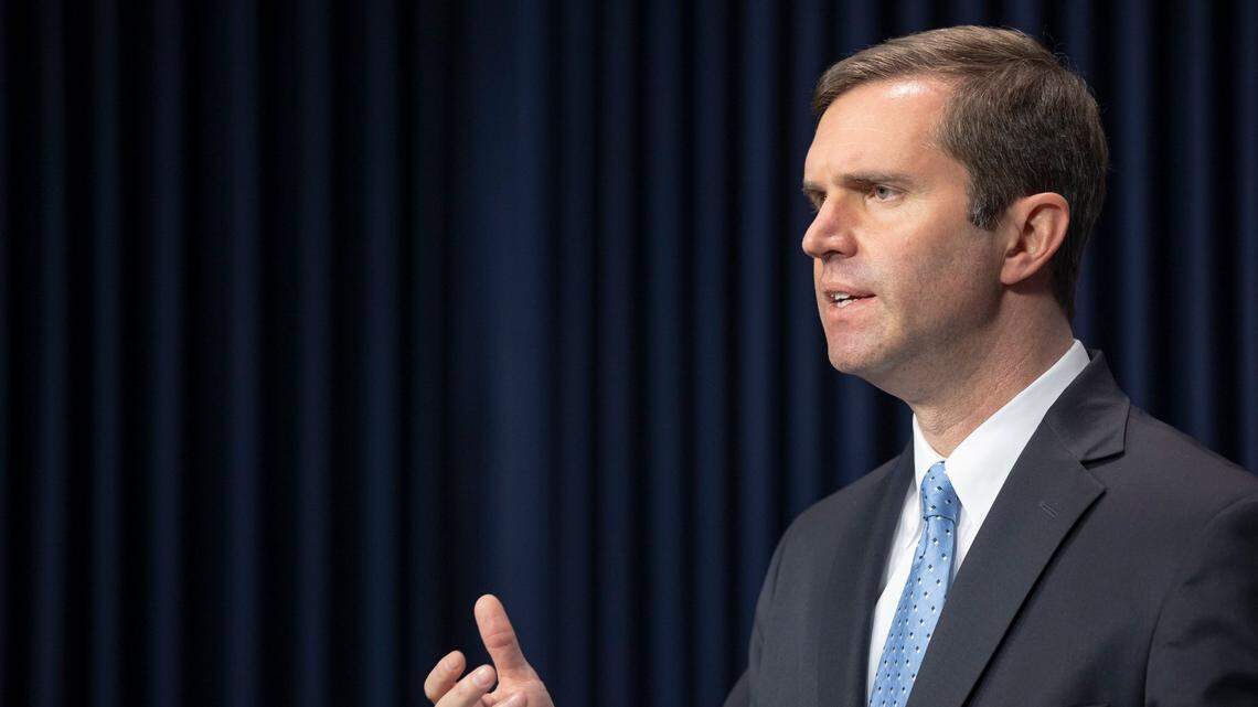 Kentucky Gov. Andy Beshear provides an update on the COVID-19 pandemic during a media conference at the state Capitol in Frankfort, Ky., on Thursday, Jan. 21, 2021.