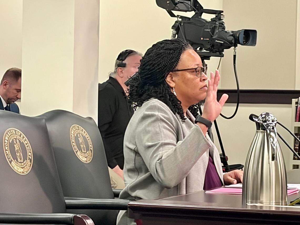 Fayette Commonwealth’s Attorney Kim Baird takes the oath before she testifies at an impeachment committee hearing for Circuit Judge Julie Goodman on Monday morning.