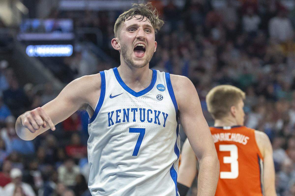 Kentucky forward Andrew Carr makes the and-one gesture after scoring a basket late in the Wildcats’ win over Illinois in the NCAA Tournament.
