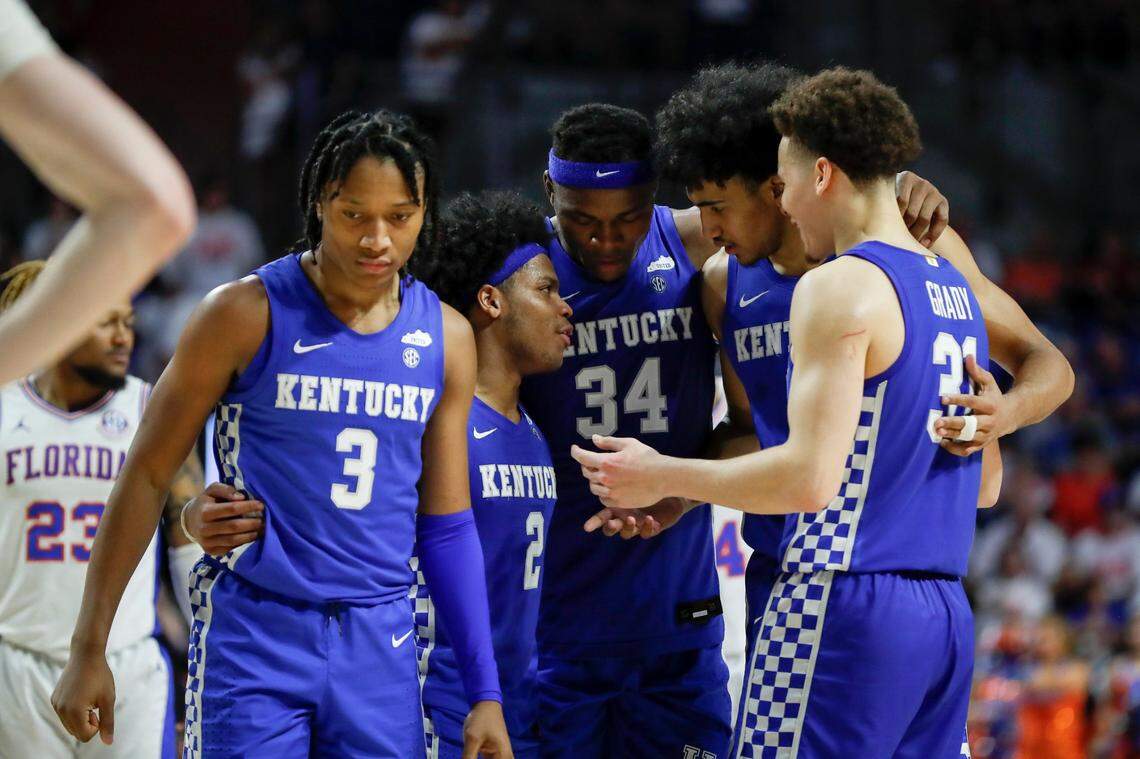 The Kentucky Wildcats huddle before UK guard TyTy Washington shoots free throws against the Florida Gators on March 5.