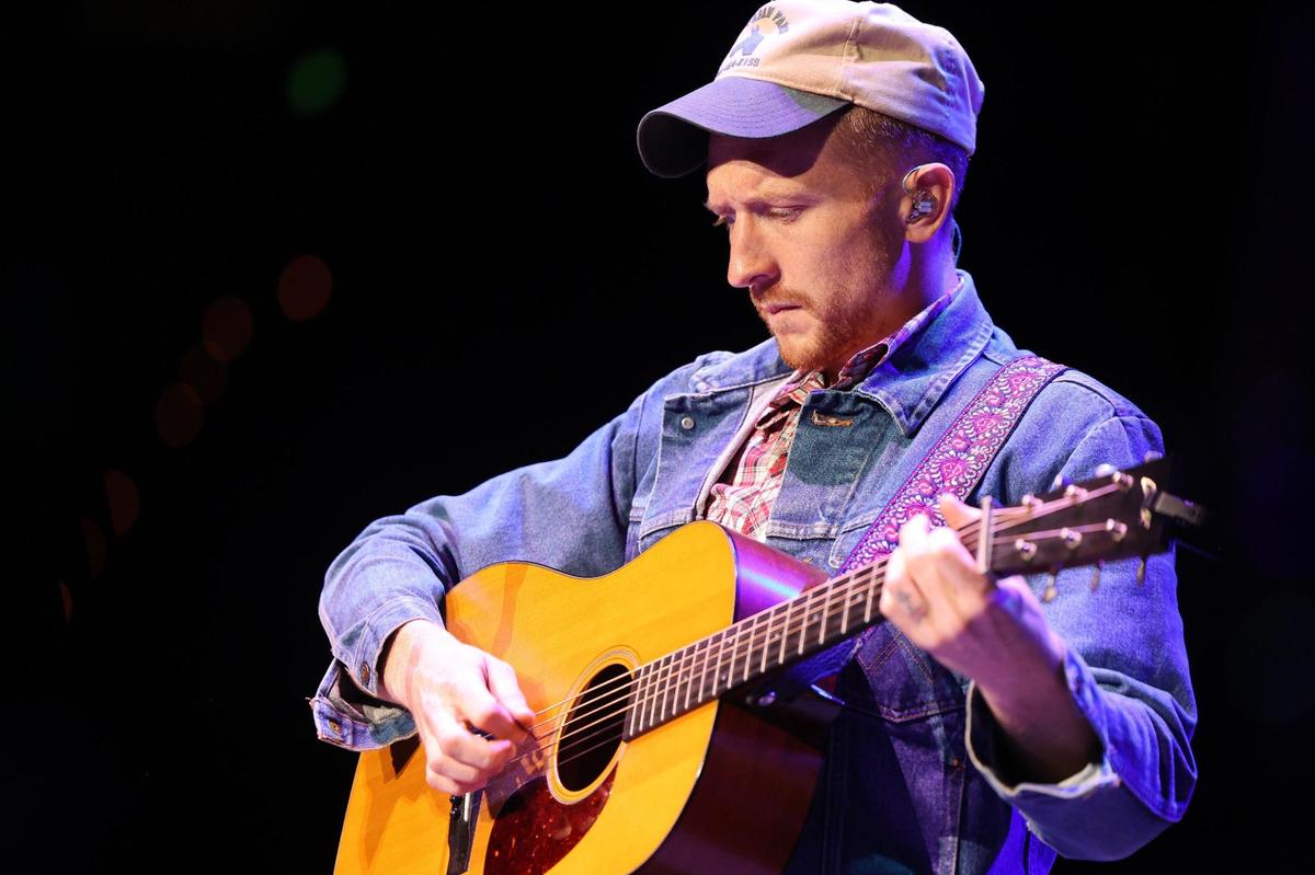 Tyler Childers performs during the Kentucky Rising benefit concert at Rupp Arena in Lexington, Ky., Tuesday, Oct. 11, 2022. (Photo by James Crisp)