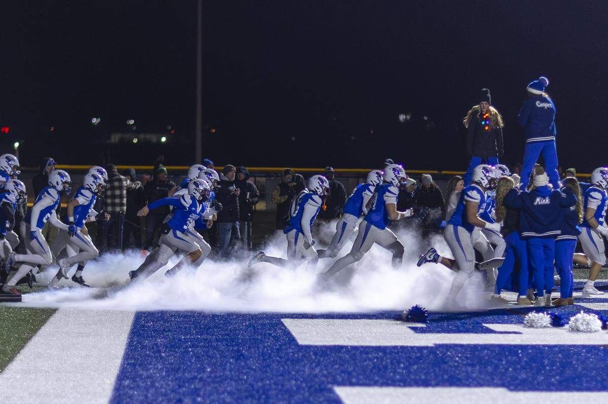 Lexington Christian players take the field before a game against Belfry in Lexington, Ky., on Friday, Nov. 28, 2025.
