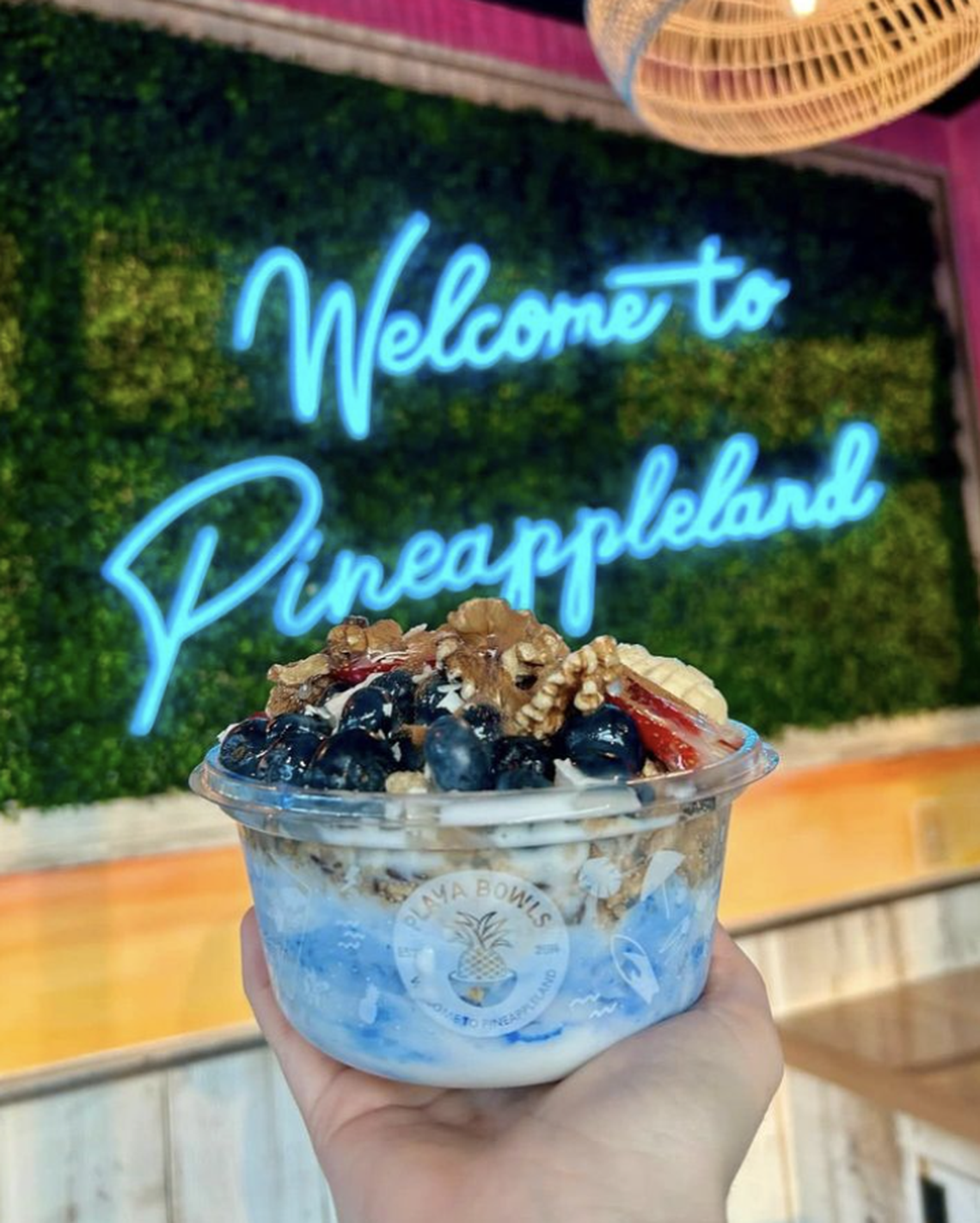 Playa Bowls sells customizable fruit bowls. You pick your base and fruits and then add drizzles and other toppings.