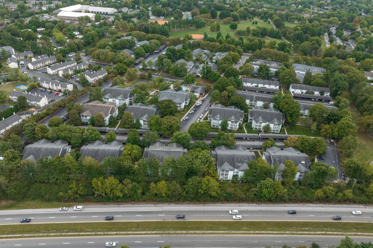 Trees, trees, trees: That’s the biggest noticeable change in 40 years between these images. The Lexington Tennis Club has grown, adding some indoor playing buildings in the upper left corner of the image. In the Oaks Condominiums forty years ago, a two bedroom, two bath condo was listed for $72,500. That same condo would cost $222,000 today, adjusted for inflation. Today listings for the same units range from $175,000-$262,000.