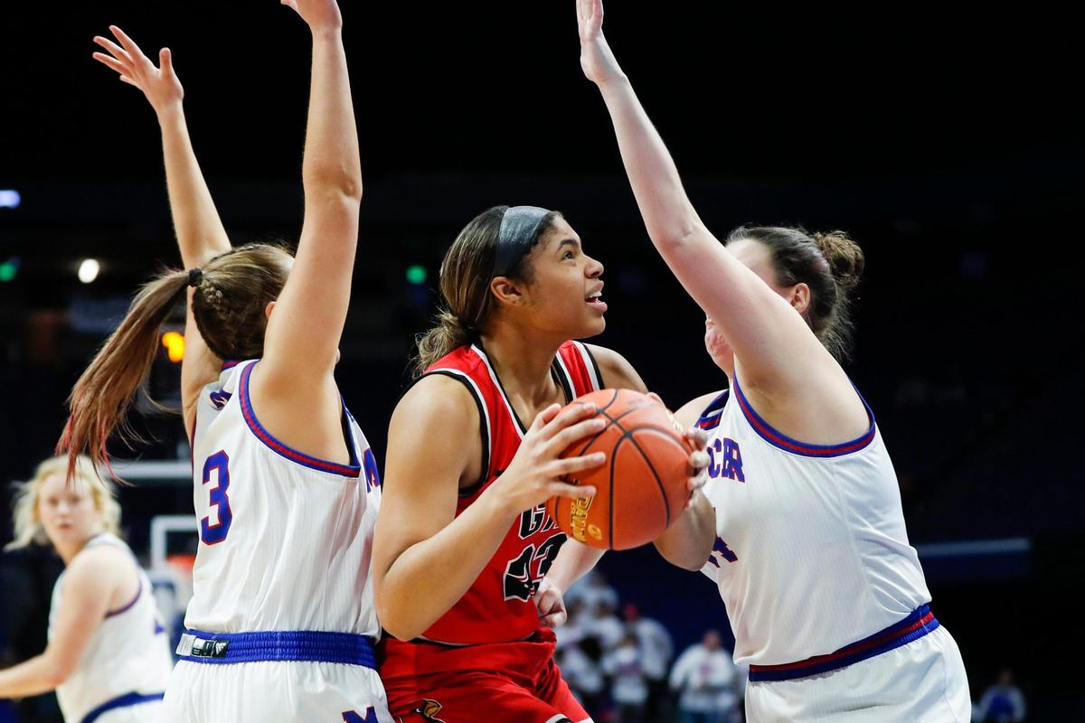 Brianna Byars, who scored 14 points for George Rogers Clark, looked for room to operate amid a Mercer County double-team.