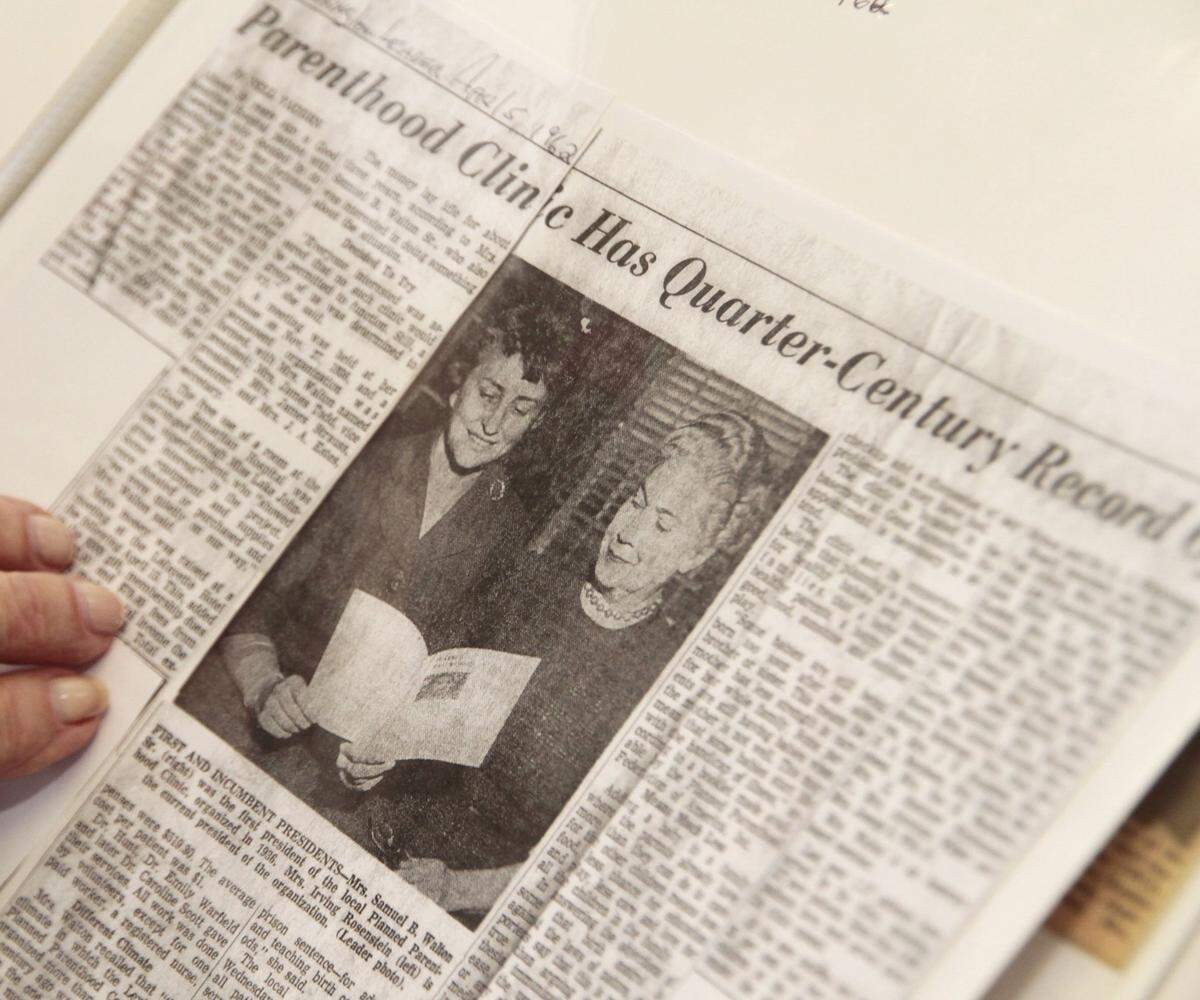 April 5, 1962 clipping from the Lexington Leader showing Irma Rosenstein, left, who at that time was president of the local Planned Parenthood, and “Mrs. Samuel B. Walton Sr.,” right, who was the first local president in 1936. Photographed on Wednesday, Sept. 21, 2011 at Bluegrass Health Center, local home of Planned Parenthood, in Lexington, Ky. The clipping was in Rosenstein’s scrapbook.