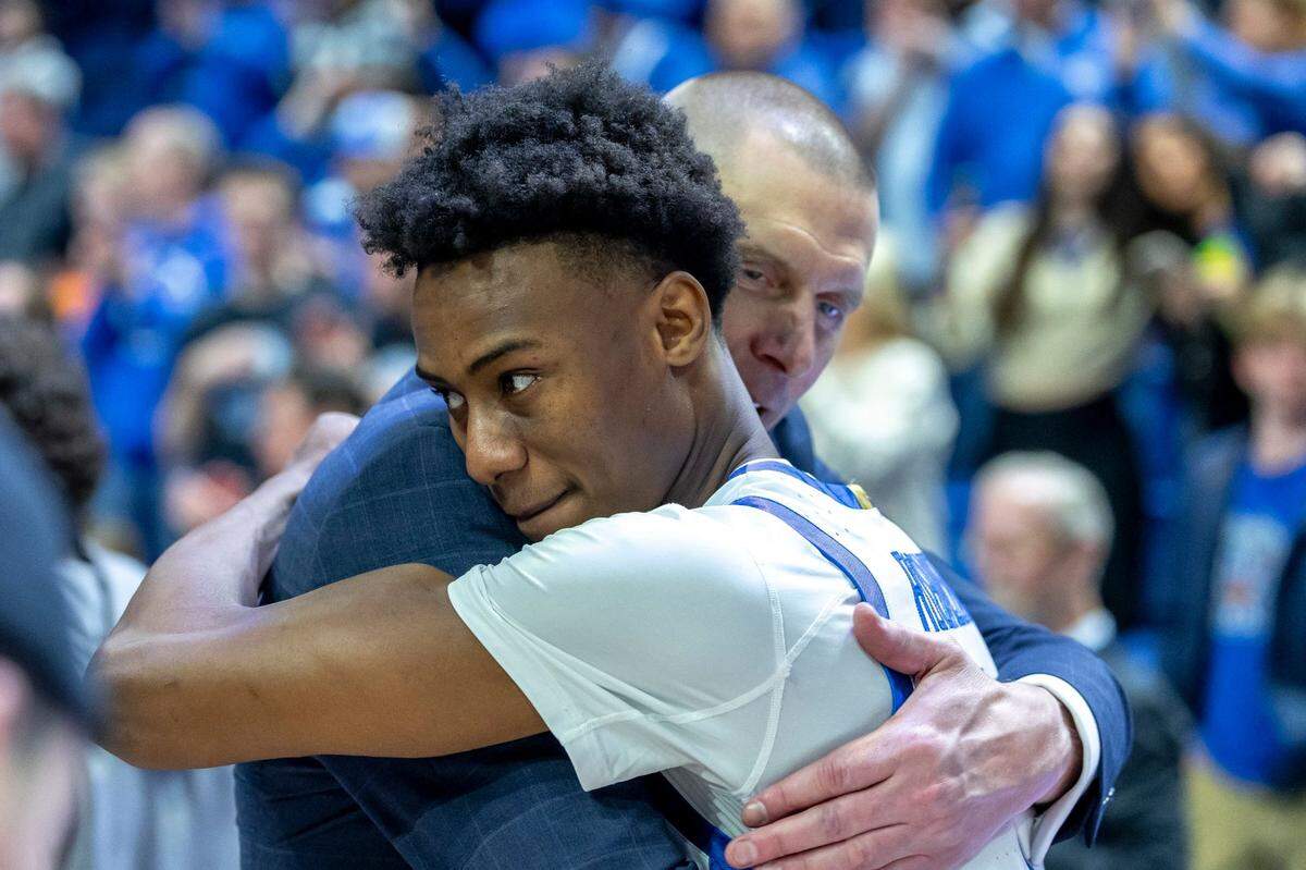 Mark Pope hugs Jaxson Robinson during UK’s win over Florida in Rupp Arena in January. Robinson was the only player on the 2024-25 Wildcats to have played for Pope previously.