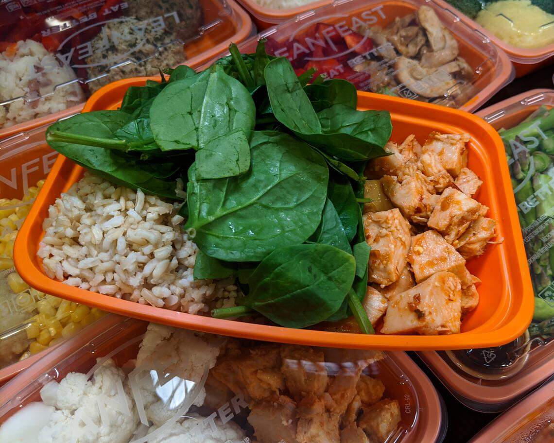 Lean Feast offers sauces to add to your meal selections, as well as seasoned proteins and fresh veggies.