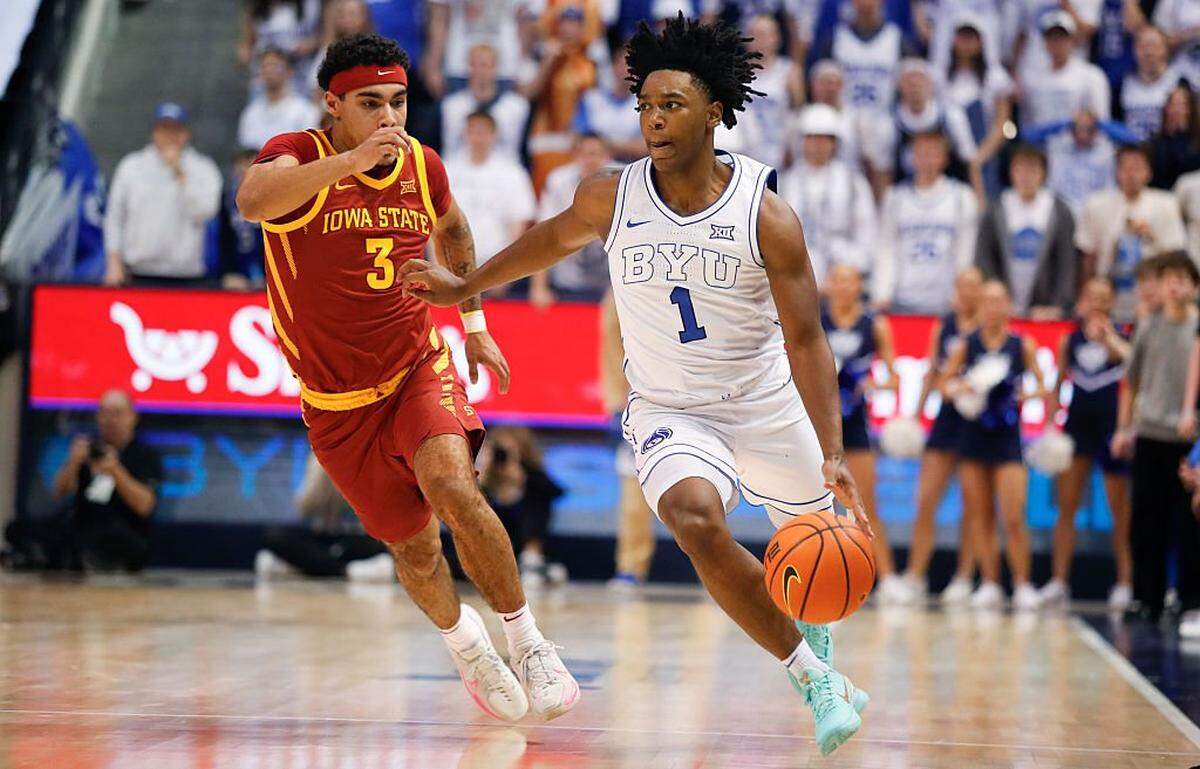 PROVO, UT - FEBRUARY 21: Robert Wright III #1 of the Brigham Young Cougars pushes past Tamin Lipsey #3 of the Iowa State Cyclones during the second half of their game at the Marriott Center on February 21, 2026 in Provo, Utah. (Photo by Chris Gardner/Getty Images)