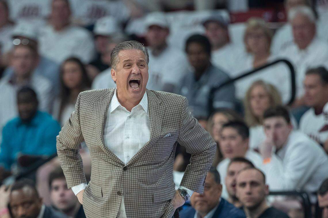 Kentucky head coach John Calipari talks to his players during Tuesday’s game against Mississippi State at Humphrey Coliseum in Starkville, Miss.