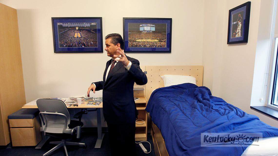John Calipari talked about one of the players' rooms during a tour of the new Wildcat Coal Lodge on the University of Kentucky campus in Lexington, Ky., Tuesday, September 18, 2012. Following the dedication of a statue of Joe B. Hall, UK basketball coach John Calipari led a tour of the players' dorm. Photo by Charles Bertram | Staff