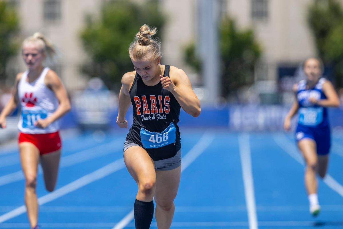 Paris’ Briley Cline wins the girls 200-meter dash during the Class A outdoor state track and field meet at the University of Kentucky on Thursday.