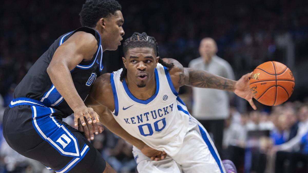 Kentucky delivers with its defense in the final seconds. Cats upset No. 6 Duke in Atlanta.