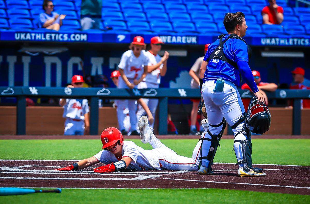 Boyd County’s Alex Maynard scores what proved to be the winning run against Wolfe County in the state baseball tourament quarterfinals at Kentucky Proud Park on Sunday.