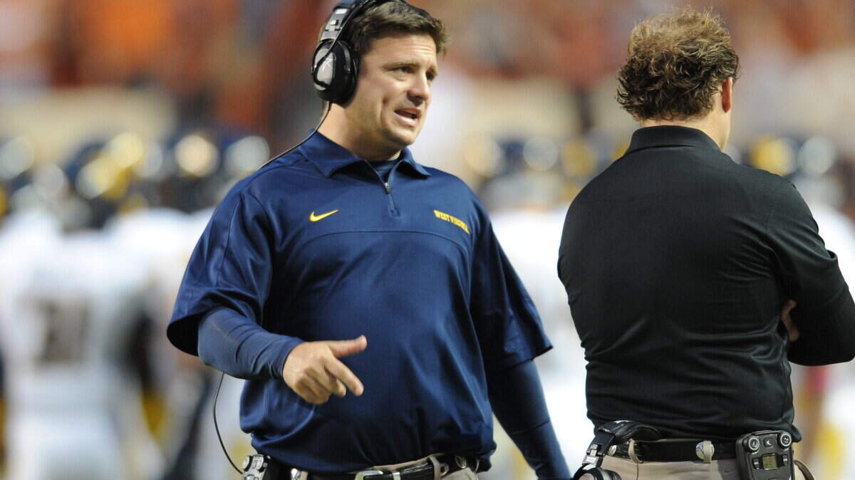 Shannon Dawson spent four seasons at West Virginia — three as offensive coordinator — before taking the same position at Kentucky.    