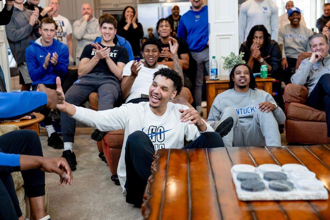 Tre Mitchell reached out to slap hands with fellow Pittsburgh-area native Adou Thiero as John Calipari looked on after Kentucky’s bracket was revealed for the NCAA Tournament.
