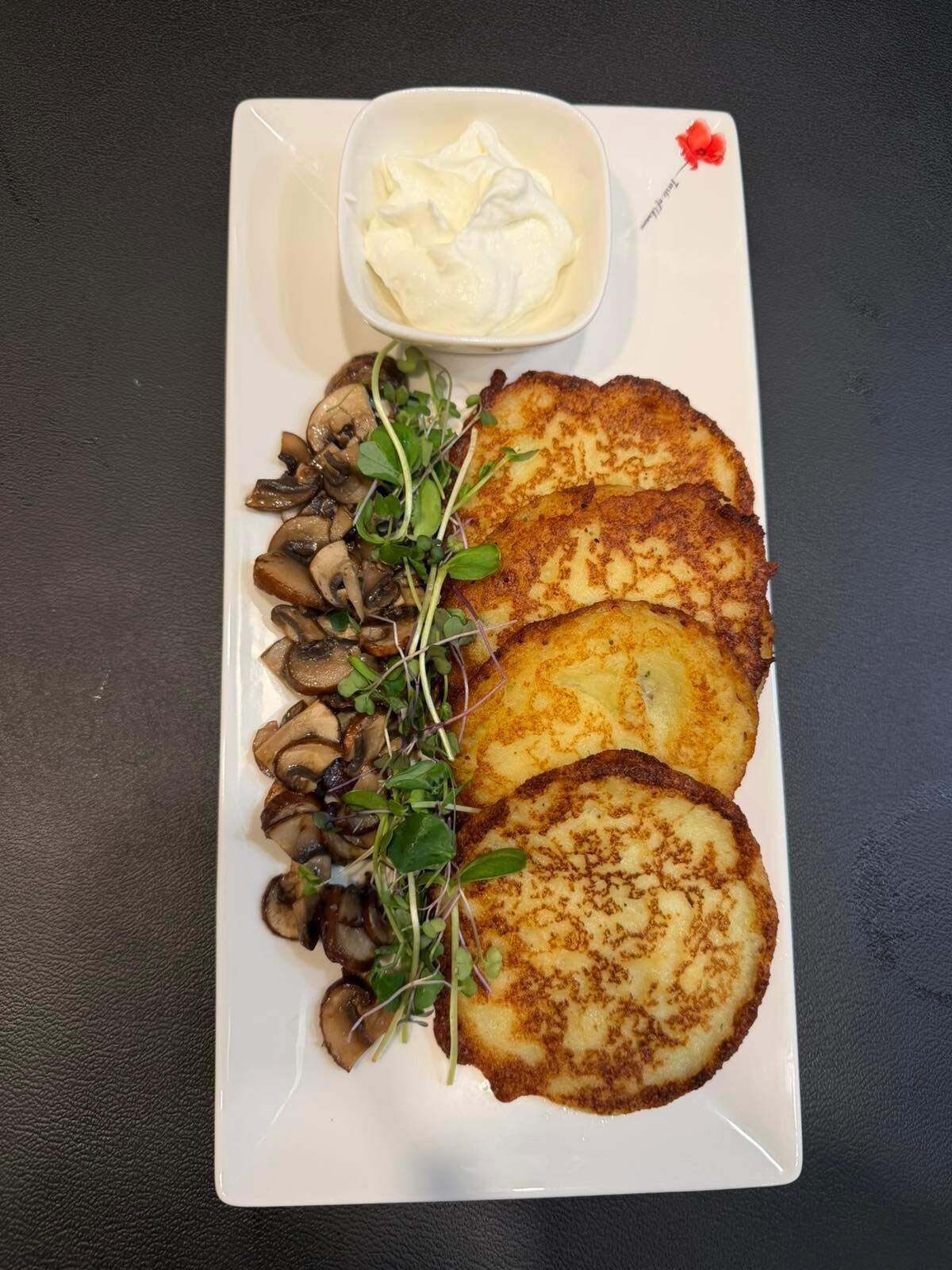 Deruny from A Taste of Ukraine’s. The crispy potato pancake dish ($17) is made with grated potatoes, onions and served with sour cream.