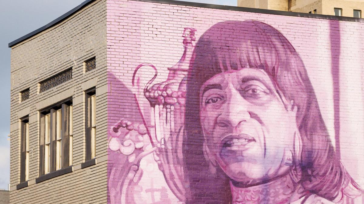 Sweet Evening Breeze portrayed by mural artist Gaia at the corner of Church Street and North Limestone in Lexington, Kentucky.