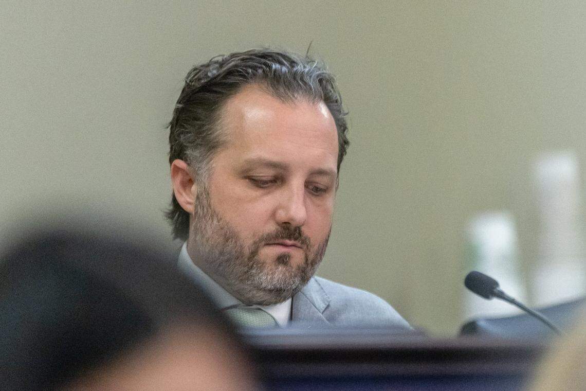 Kentucky state Rep. Josh Bray, R-Mount Vernon, reviews a document during a state House Committee Appropriations & Revenue hearing in Frankfort, Ky., on Wednesday, Feb. 25, 2026.
