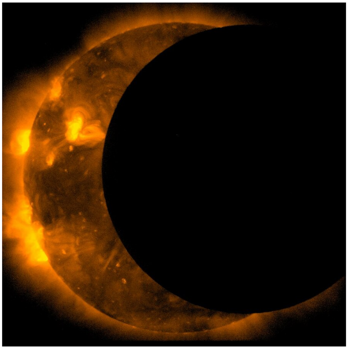 A screenshot of a photograph capturing an annular eclipse. The eclipse occurred during the 2012 Hinode mission. 