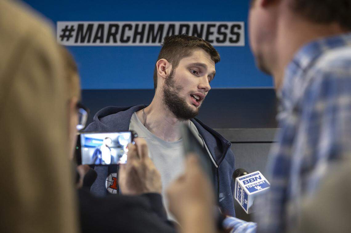 Illinois Fighting Illini center Tomislav Ivisic (13) talks to members of the media at Fiserv Forum in Milwaukee, Wis., on Saturday, March 22, 2025, a day before Illinois’ second round NCAA Tournament game against Kentucky.