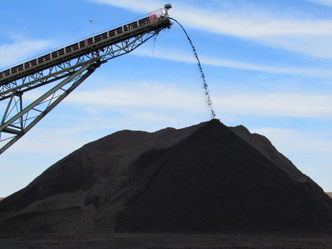 Coal produced at an underground mine in Kentucky poured from the end of a conveyor onto a pile being used to load trucks in December 2018.