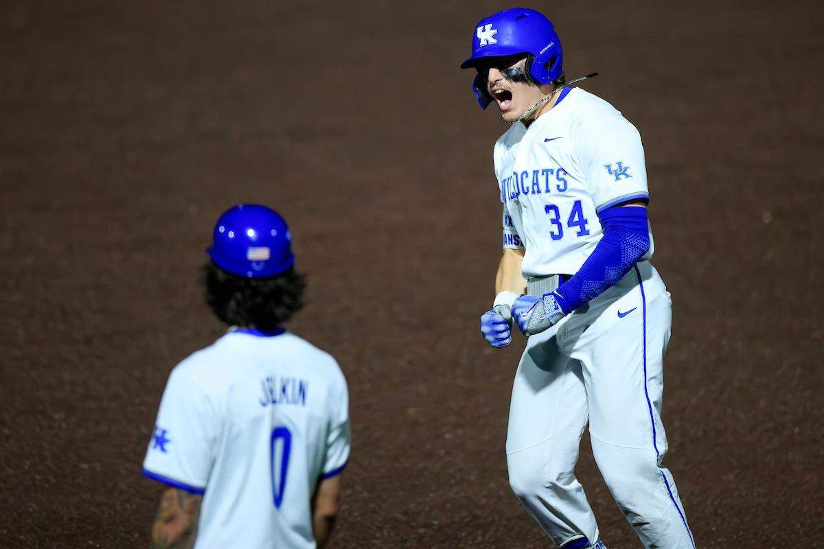 Kentucky center fielder Carson Hansen (34) hit one of the Wildcats’ two home runs against Louisville on Tuesday night. Third baseman Patrick Herrera smacked the other one.