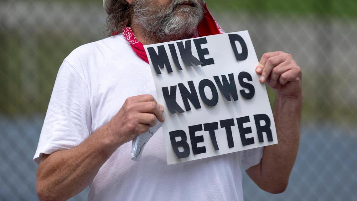 ‘Deliver for us.’ Postal workers rally in USPS leader’s Kentucky hometown