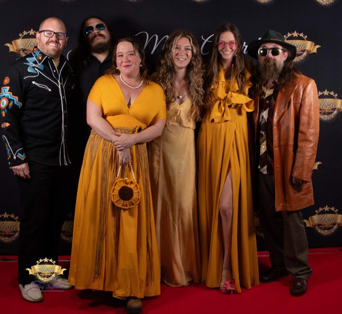 Them Lasses & The Old Dogs include members, from left, Ryan Shelton, Randon Uhrig, Brittany Dawn Samples, Abby Rank, Erin Sliney, and Collin Wallace.