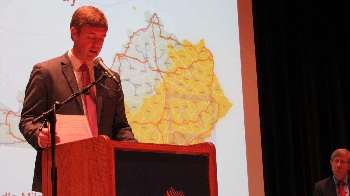A photo of a 2015 event featuring Jared Arnett, former executive director of SOAR, who said jobs will go elsewhere without broadband.
