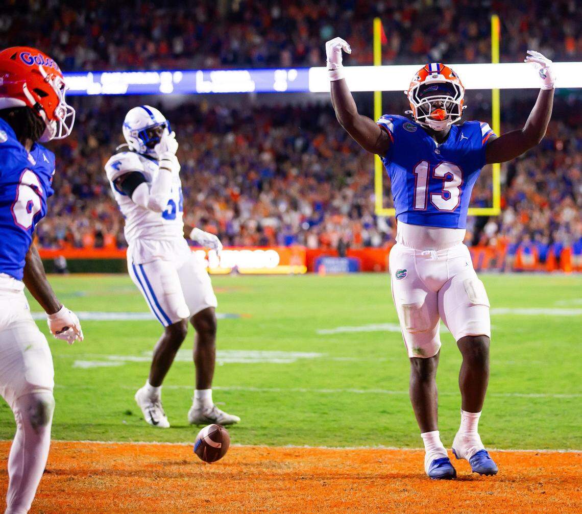 Florida Gators running back Jadan Baugh (13) celebrates his touchdown during the first half at Ben Hill Griffin Stadium in Gainesville, FL on Saturday, October 19, 2024 against the Kentucky Wildcats. [Doug Engle/Gainesville Sun]