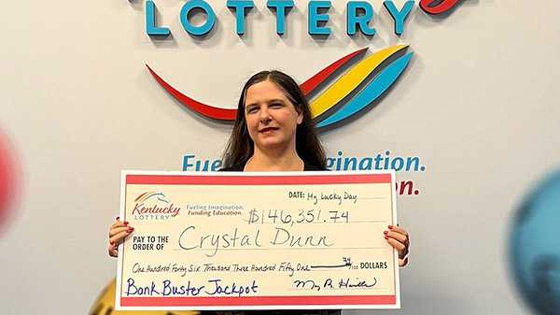Crystal Dunn, of Louisville, passed out gift cards to strangers after winning big in the Kentucky Lottery.