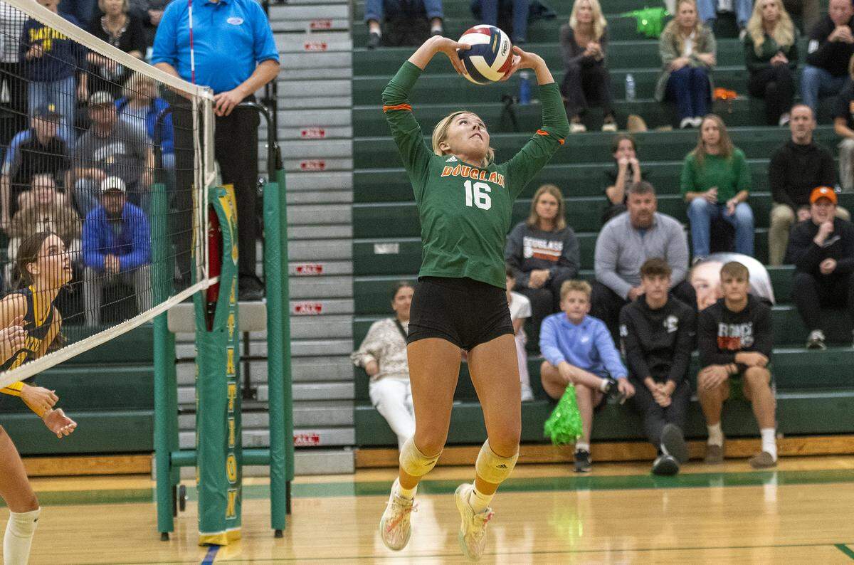 Frederick Douglass senior setter Olivia Orr delivers a pass during the Broncos’ 3-1 win against Sayre in the 42nd District girls volleyball tournament championship game at Bryan Station High School on Thursday.