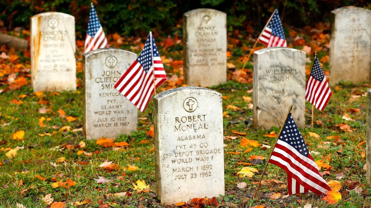 Members of the Henry Clay High School R.O.T.C. placed more than 500 flags at the graves of veterans as the National Association for Black Veterans held a Veteran’s Day Memorial service during a chilly Friday morning rain shower at Cove Haven Cemetery in Lexington. Over 500 veterans are buried in the cemetery located at the end of Whitney Avenue. Veteran’s Day is Sunday, November 11.