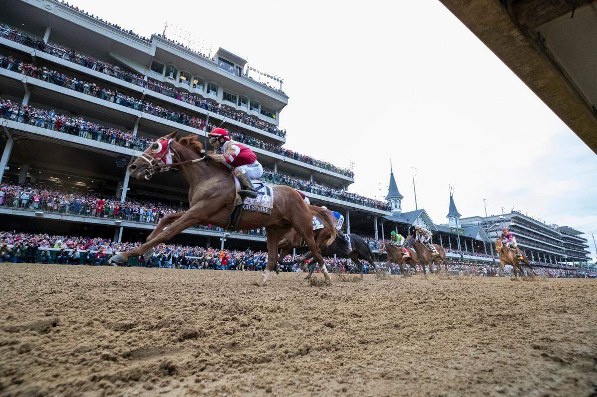 With favorite Epicenter and Zandon dueling in front, Rich Strike came charging up the rail for a stunning 80-1 upset in the Kentucky Derby on Saturday at Churchill Downs.