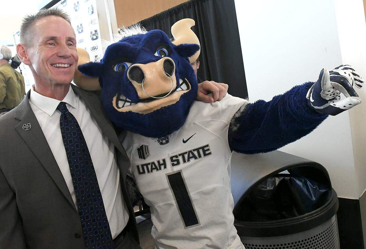 Gary Andersen posed for a photo with mascot Big Blue after he was introduced as the new head football coach at Utah State on Dec. 11.