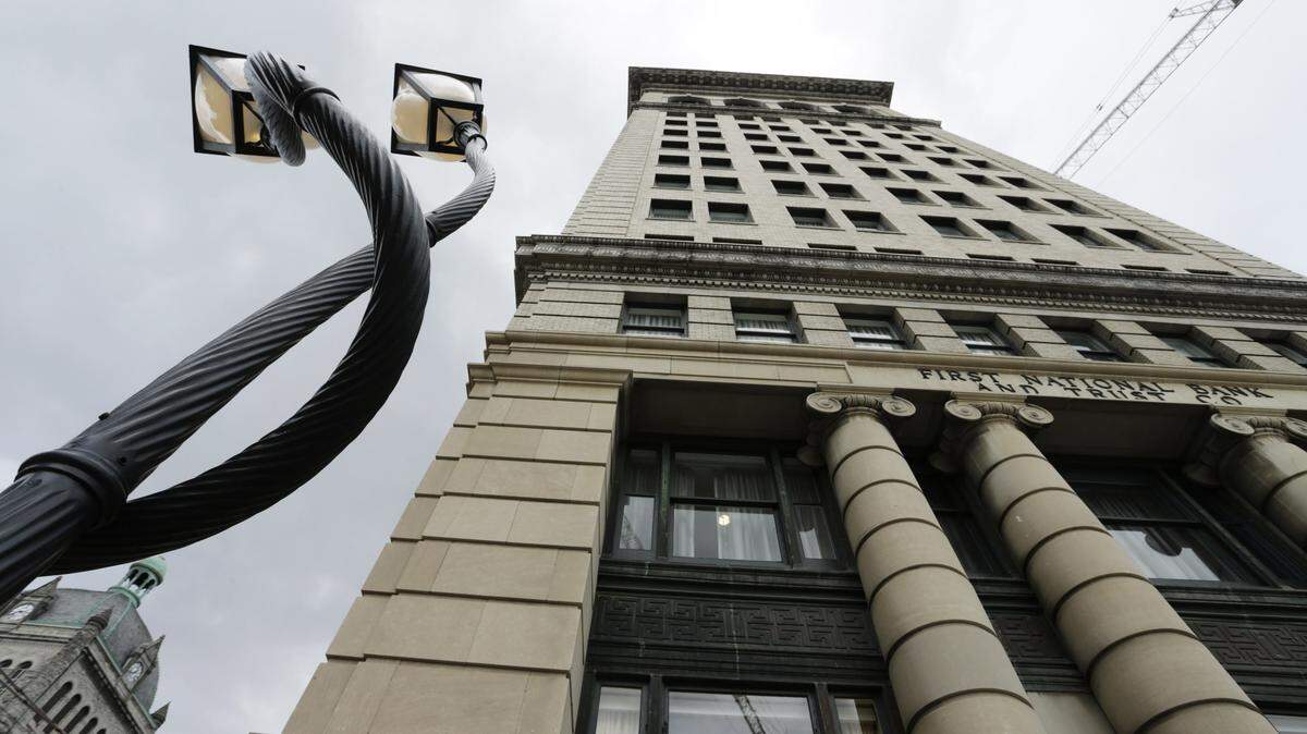 A sculpture of intertwined street lights outside 21c in Lexington.  The upscale hotel in the over 100-year-old bank tower building houses a museum, restaurant on West Main Street. And there will be yoga there Sunday morning.