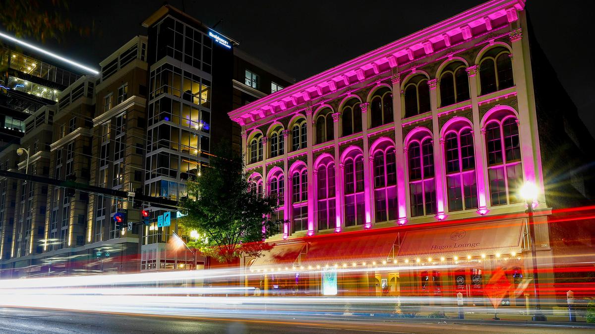The McAdams and Morford Building along West Main Street is illuminated as part of the LexLights! program in Lexington, Ky., Thursday, Oct. 31, 2019. The LED lights can be easily changed to accommodate different seasons or holidays.
