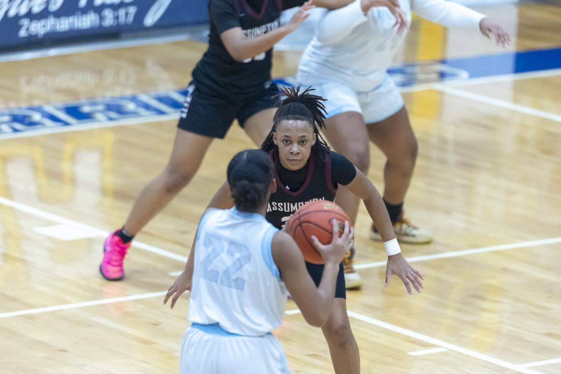 Assumption's Ashlinn James, right, defends against Danville Christian's Nadya Abrams (22) during a game at Danville Christian Academy in Danville on Jan. 16, 2025. The Rockets are this season’s No. 1 team in the first Kentucky Media Elite 16 poll of the season.