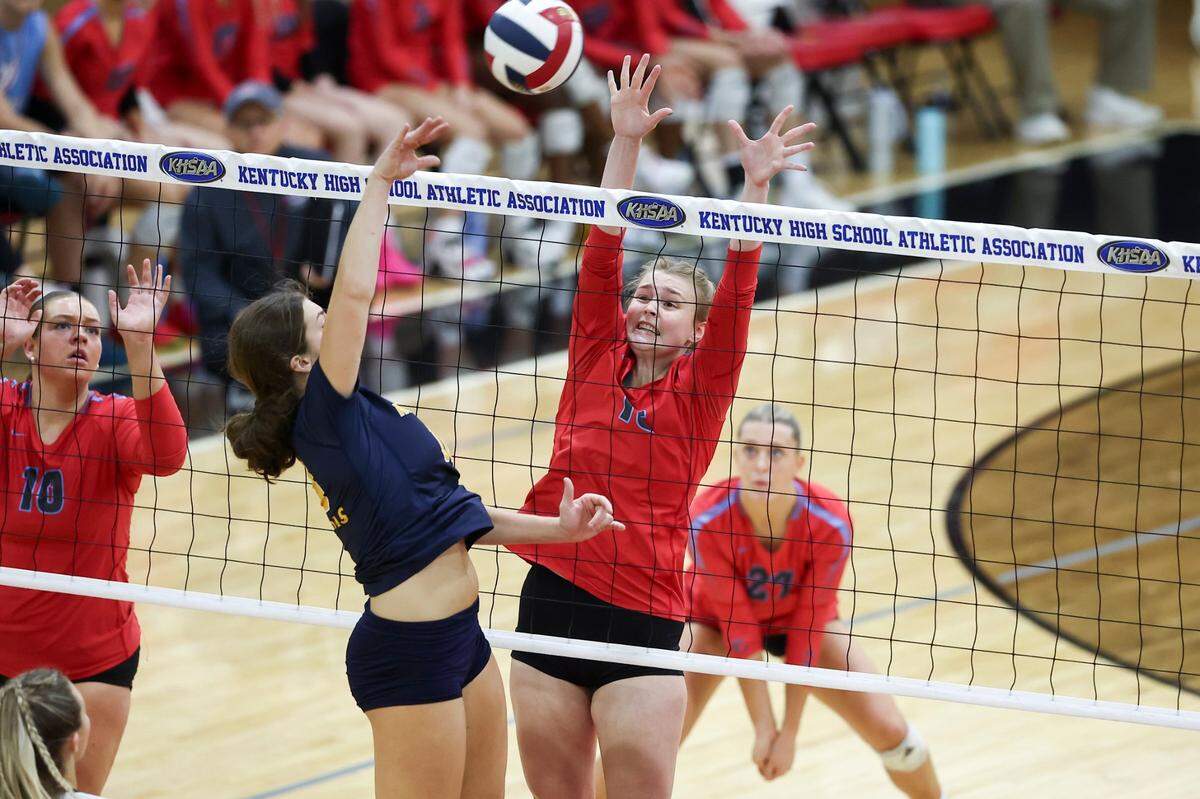 West Jessamine’s Abi Bruner (16) tries to block the ball against Notre Dame in the KHSAA state semifinals at George Rogers Clark High School.