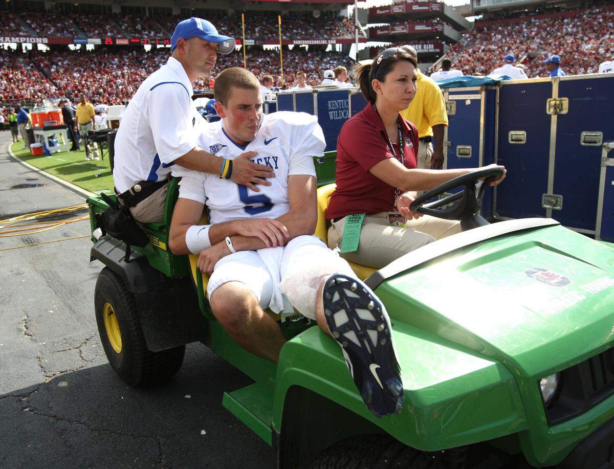 UK quarterback Mike Hartline was carted off the field after injuring his knee early in the third quarter of a 28-26 loss at South Carolina in UK’s fifth game of the 2009 season.