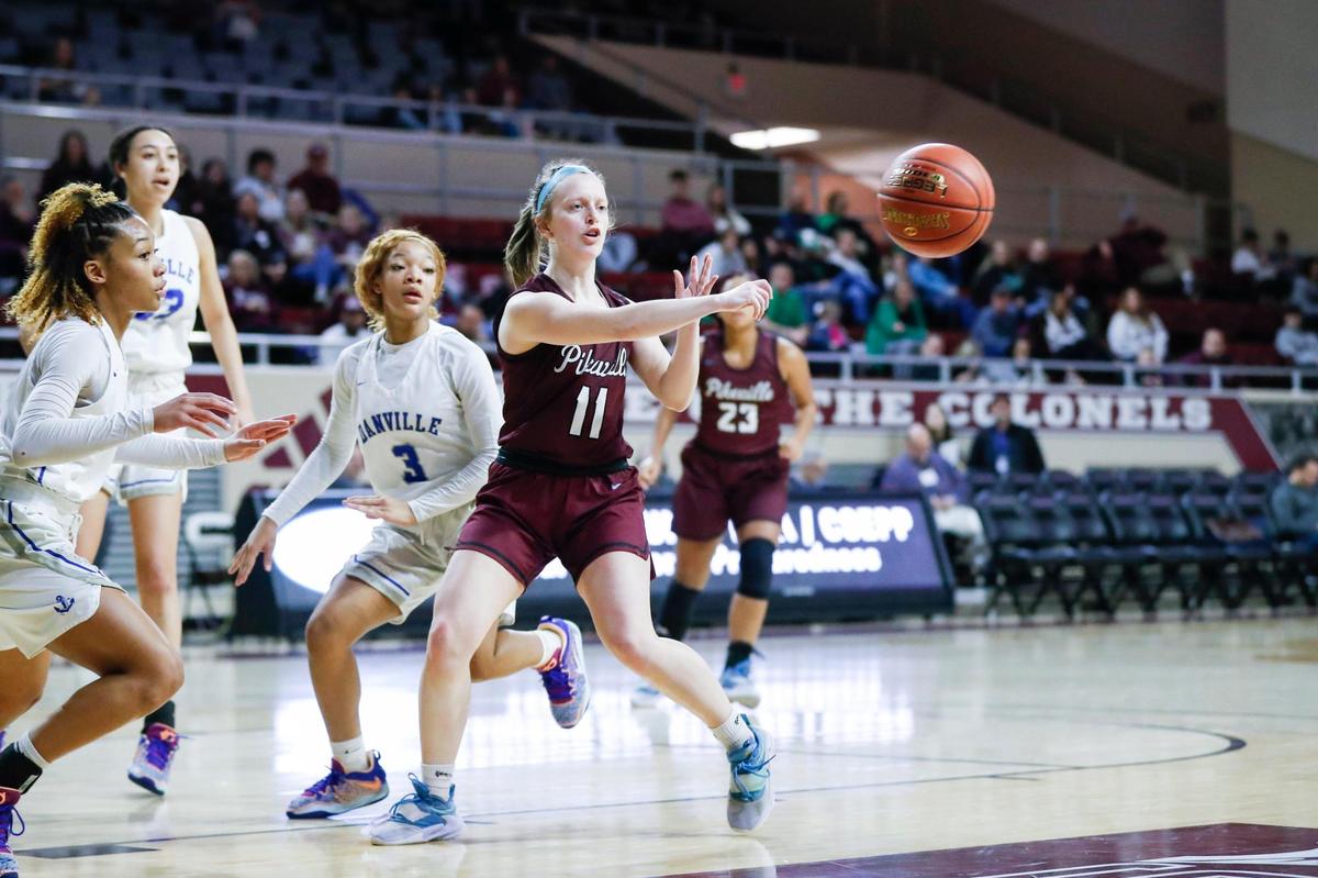 Pikeville’s Trinity Rowe (11) passes the ball against Danville during the All “A” Classic girls tournament quarterfinals game at EKU McBrayer Arena in Richmond on Jan. 27, 2023.
