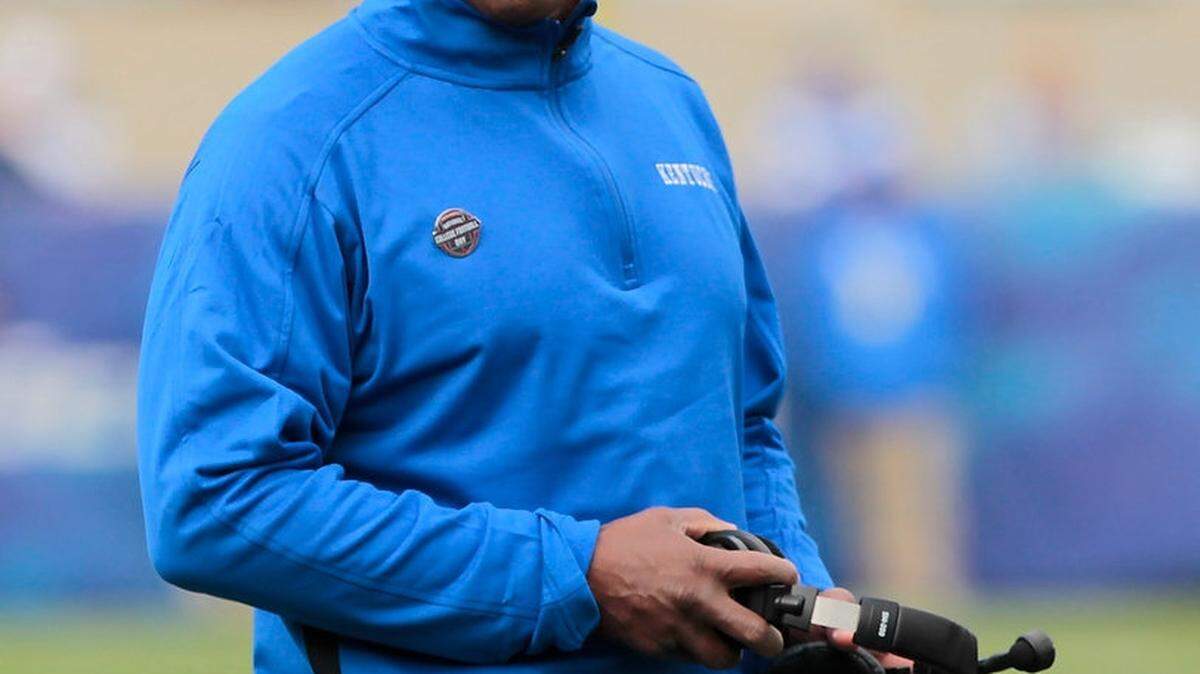 Kentucky head coach Joker Phillips walked on to the field during a time out in the third quarter of the Vanderbilt at Kentucky football game at Commonwealth Stadium in Lexington, Ky., on Saturday Nov. 3, 2012. Photo by Pablo Alcala | Staff