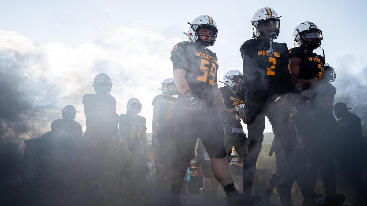 Woodford County walked onto its field before its game against Franklin County on Friday, Sept. 17, 2021, in Versailles. Woodford County won 24-21 and is ranked in the top 10 in the latest Associated Press poll for Class 5A.