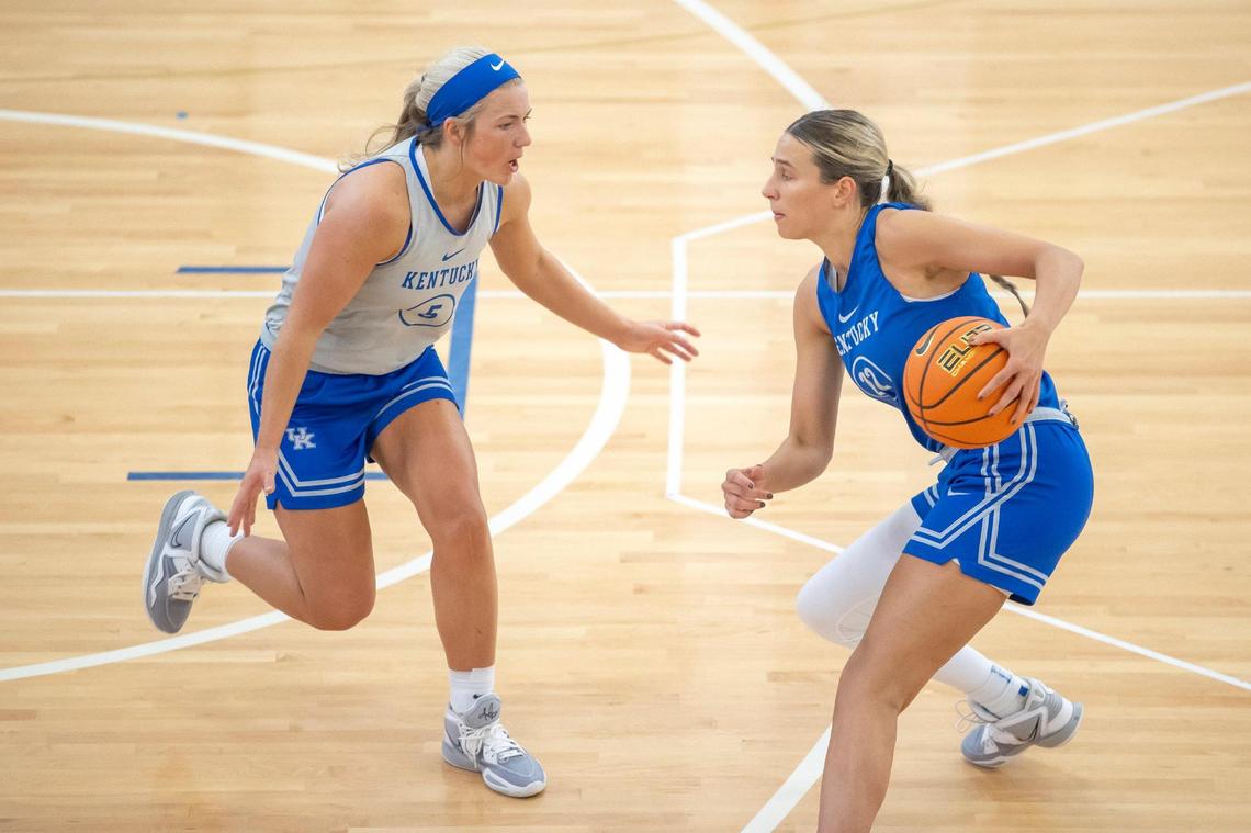 Maddie Scherr, right, squared off against teammate Cassidy Rowe (5) during Tuesday’s practice at the Joe Craft Center..