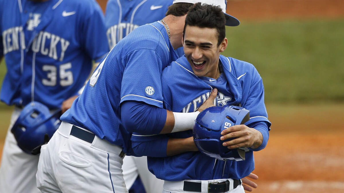 Austin Cousino, right, set UK freshman records for hits (76) and runs scored (56). He was named Freshman of the Year by SEC coaches, who also picked him for the all-defensive team.