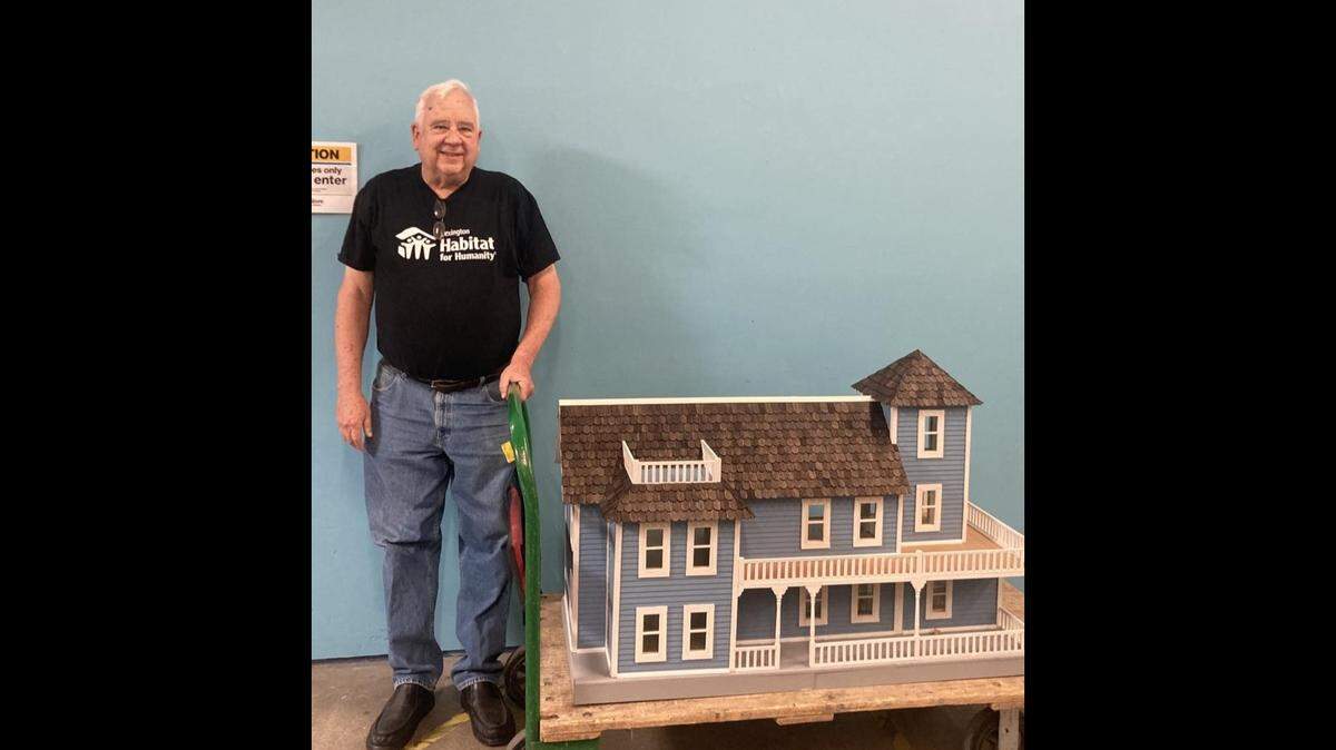 Larry Kuharik, who volunteers three days a week at the Lexington Habitat ReStore, built a dollhouse from a kit that was donated. He said the kit was missing the doors, windows, shingles and some other pieces, so he crafted those himself.