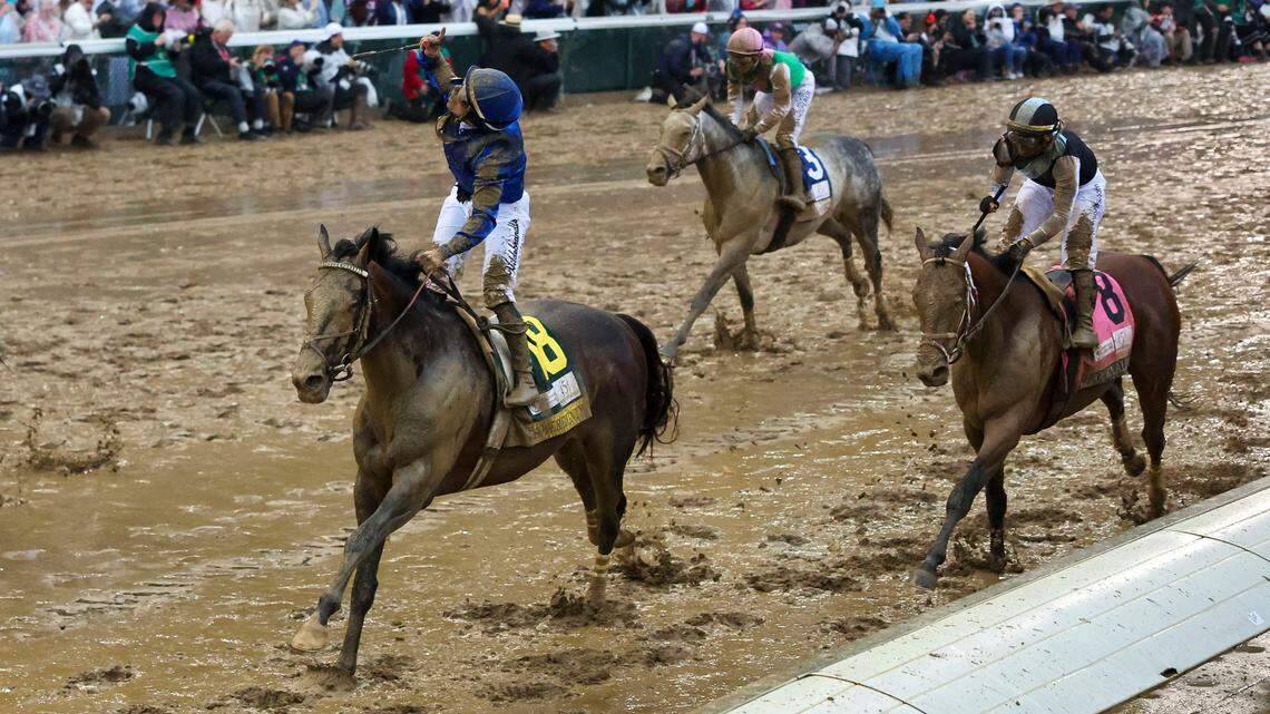 Sovereignty, with jockey Junior Alvarado up, left, wins the Kentucky Derby on Saturday, May 3, 2025 at Churchill Downs in Louisville.